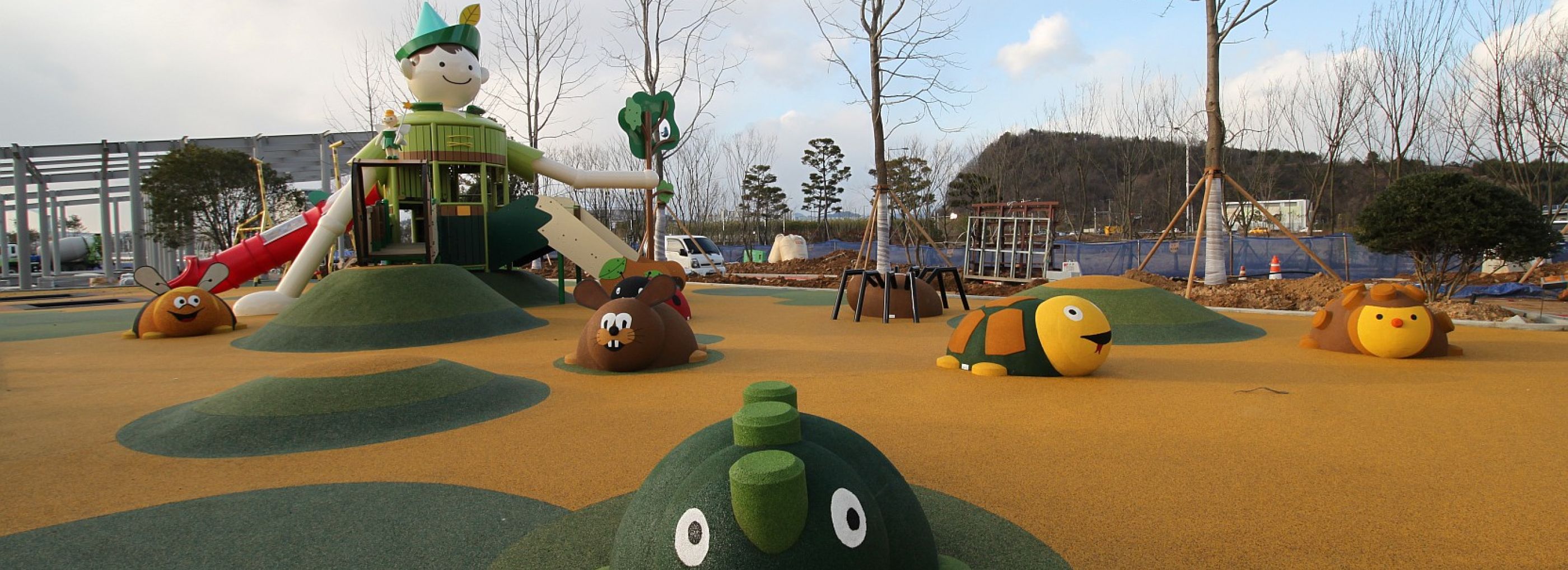 Outdoor playground with a range of 3D play animals including a hedgehog, tortoise and rabbit.